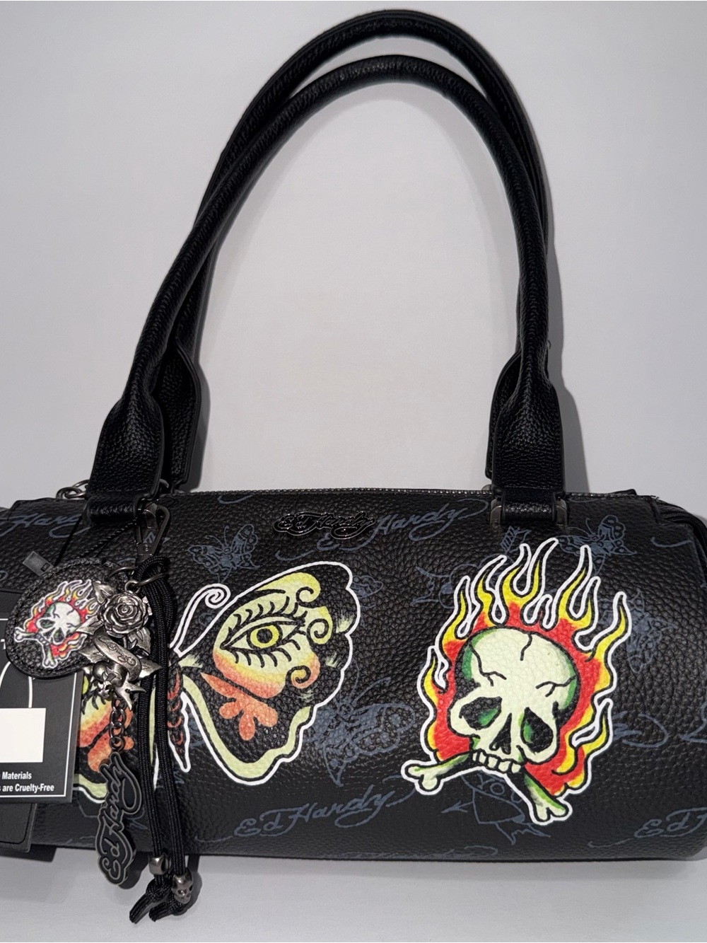 Edgy Black Barrel Bag with Colorful Tattoo Graphics